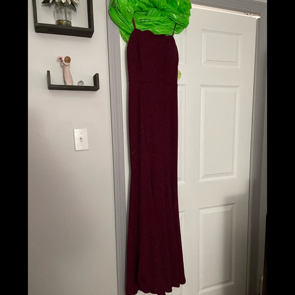 Beautiful brand new full length gown. Never worn due to cancellation of dance:(